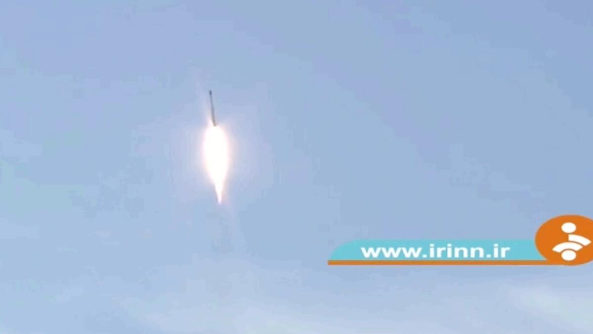 This image taken from video footage aired by Iranian state television shows the launch of a rocket by Iran announced on Thursday. — AP