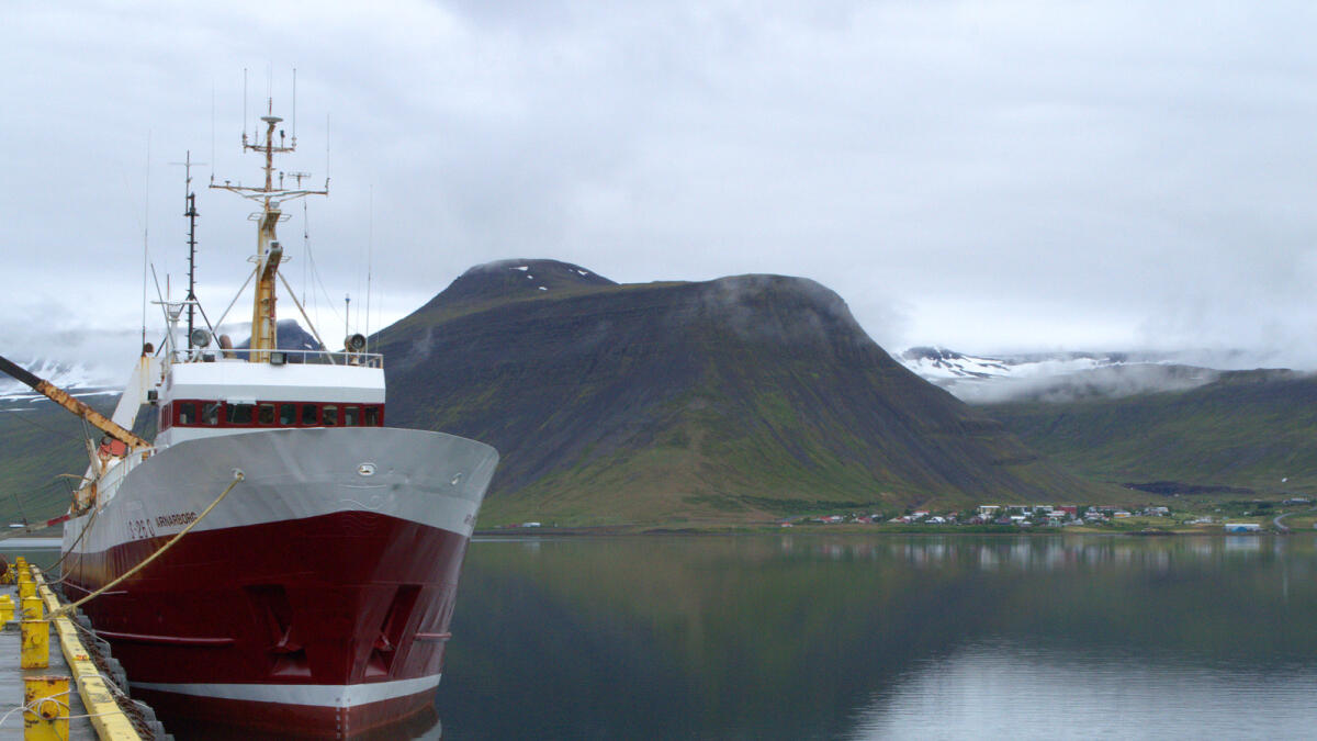 A trawler docked in the harbor of Isafjordur, a town of 2,700 people