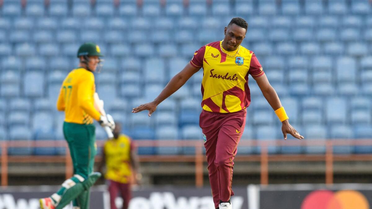 Dwayne Bravo of West Indies celebrates the dismissal of George Linde of South Africa during the 4th T20I. — AFP