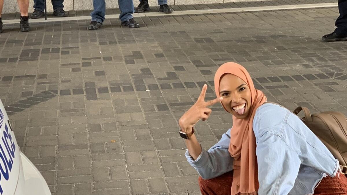 Muslim womans picture with anti-Islam protesters goes viral
