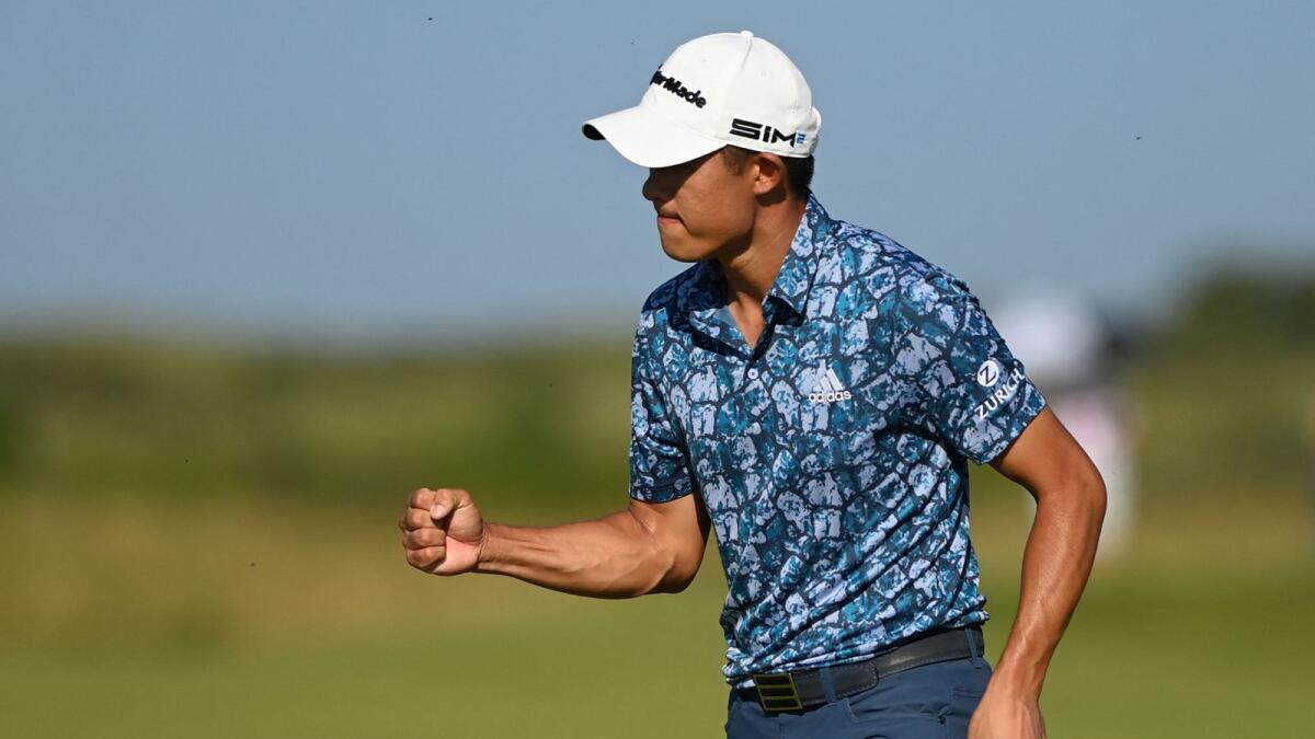 US golfer Collin Morikawa celebrates after a put on the 14th green. — AFP