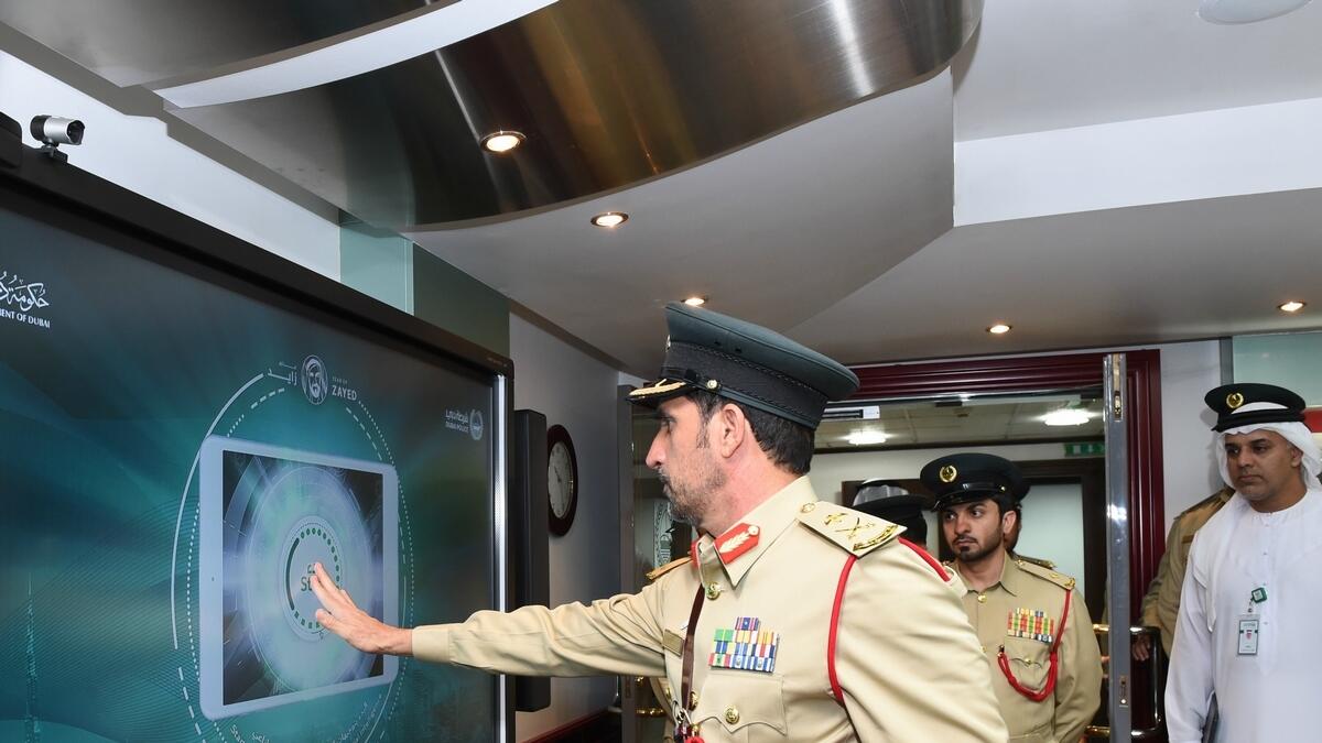 Major-General Abdullah Khalifa Al Marri views some of the AI projects at the General Department of Artificial Intelligence.