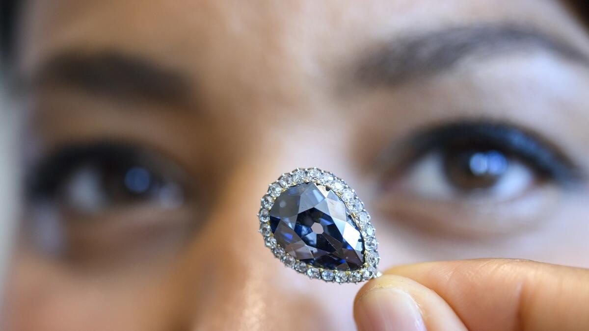 Three diamonds fetch $24.1 million at auction