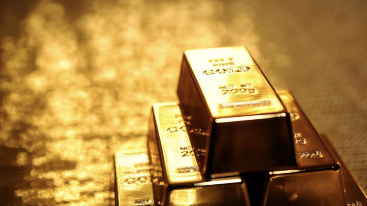 Precious gold rises to over 5-year peak after Federal Reserve hints at rate cuts 