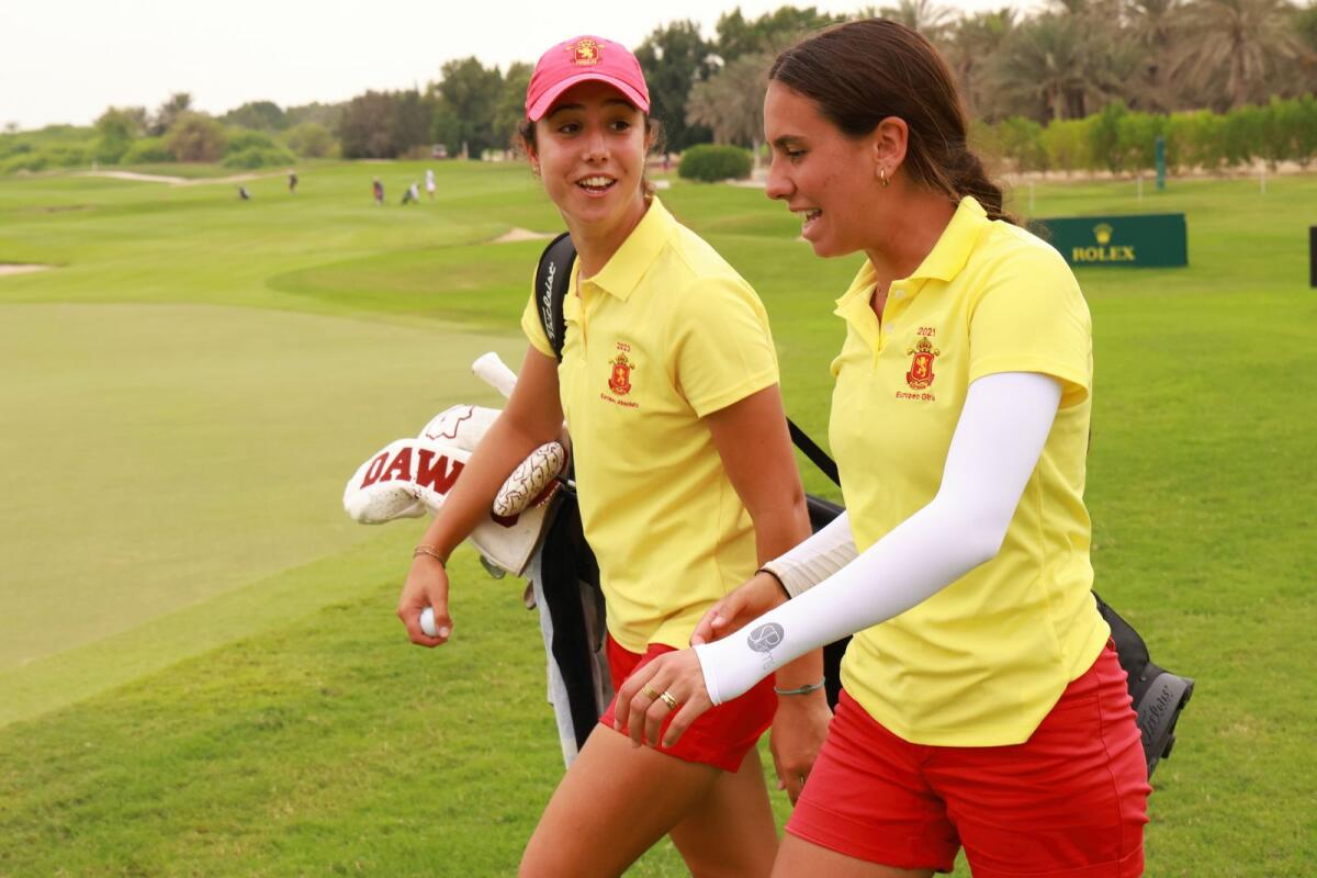 Julia Lopez Ramirez, (left), and Cayetana Fernandez Garcia-Poggio of Spain at the 18th green during the second round of the Women’s World Amateur Team Championship at Abu Dhabi Golf Club. - Supplied photo