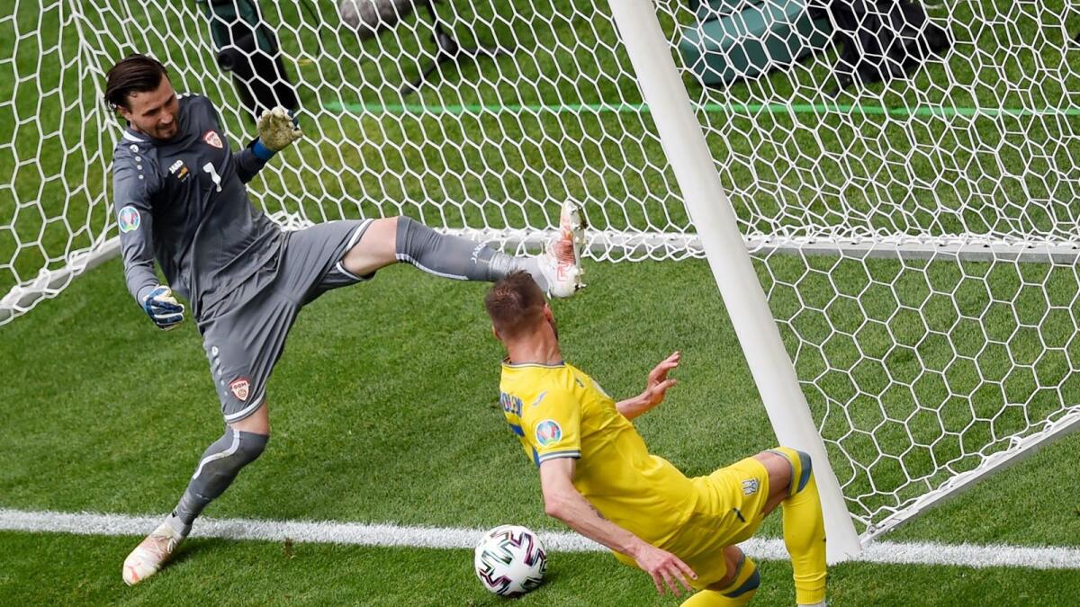 Ukraine's Andriy Yarmolenko scores the team's first goal against North Macedonia. (Reuters)