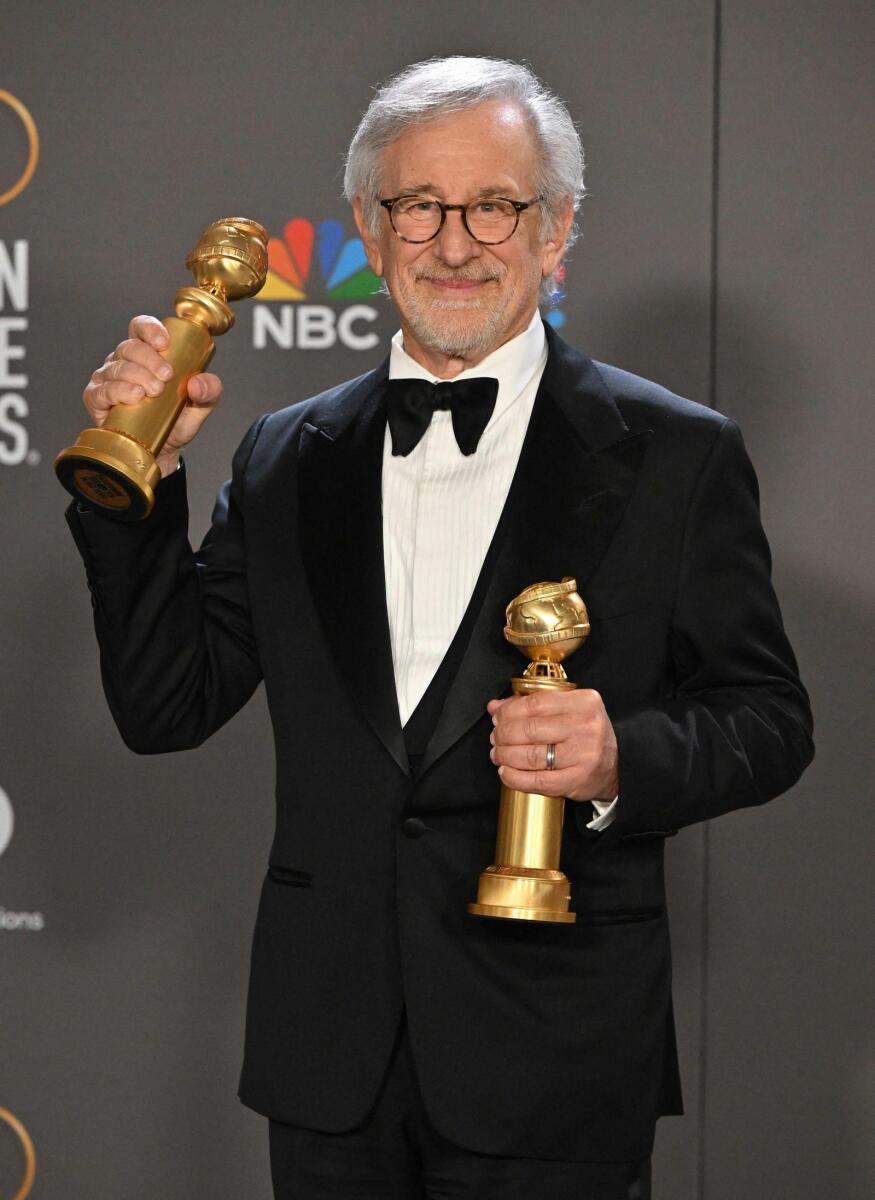 US director Steven Spielberg poses with the awards for Best Director - Motion Picture and Best Picture - Drama for 'The Fabelmans'