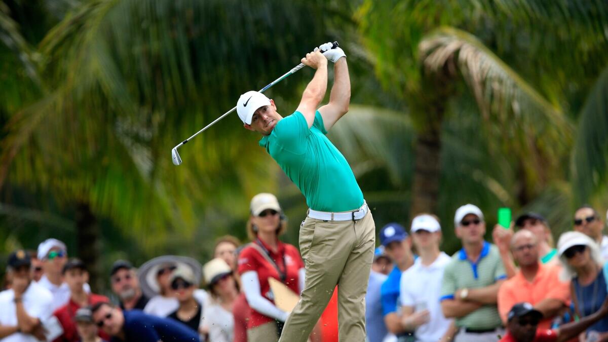 DORAL, FL - MARCH 05: Rory McIlroy of Northern Ireland takes his second shot on the first hole during the third round of the World Golf Championships-Cadillac Championship at Trump National Doral Blue Monster Course on March 5, 2016 in Doral, Florida.   David Cannon/Getty Images/AFP== FOR NEWSPAPERS, INTERNET, TELCOS &amp; TELEVISION USE ONLY ==
