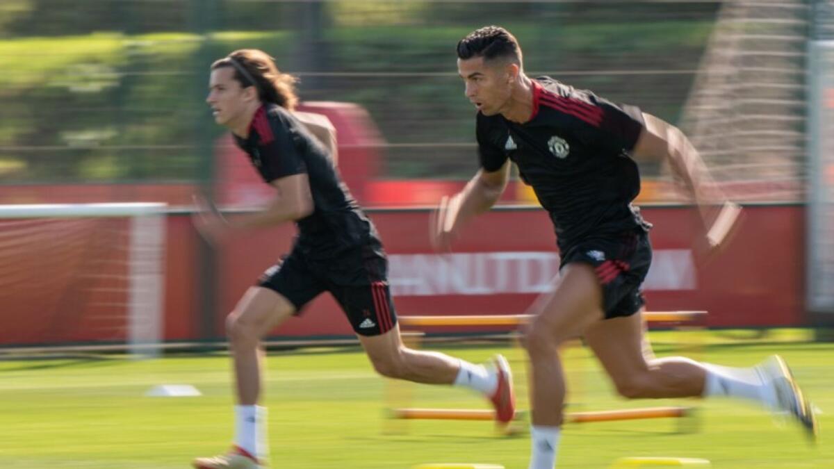 Cristiano Ronaldo (right) during a training session. (Manchester United Twitter)