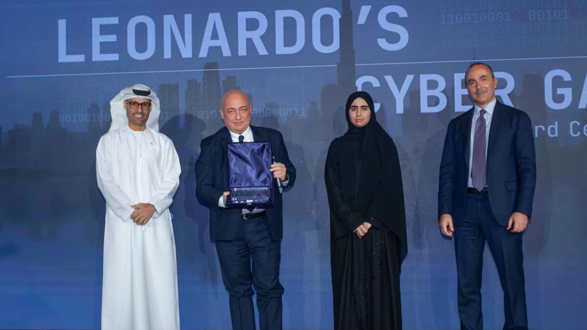 Dr Carlo Loveri and Khawla Al Hammadi, Emirates Steel, with Dr Mohamed Hamad Al-Kuwaiti, the UAE Government’s Head of Cyber Security, and Tommaso Profeta, Managing Director of Leonardo’s Cyber Security Division