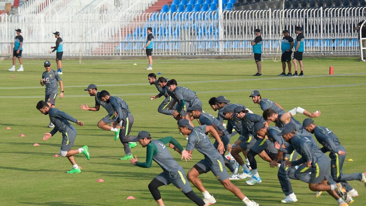 Pakistan's cricketers warm up during a practice session at the Rawalpindi Cricket Stadium. — AFP