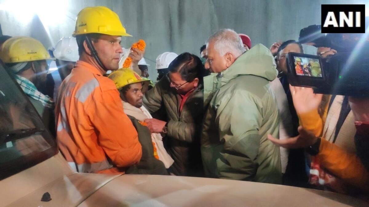 Photo: CM Pushkar Singh Dhami meets the workers who have been rescued from inside the Silkyara tunnel. ANI