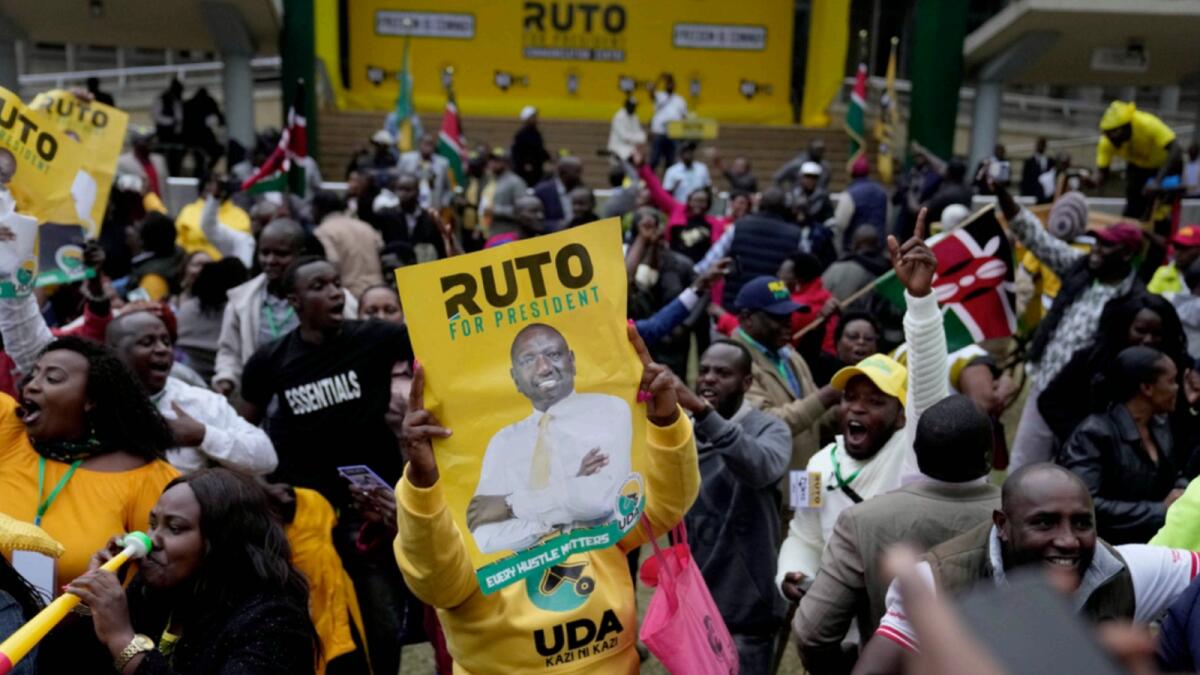 Supporters of William Ruto celebrate at his party headquarters in Nairobi. — AP