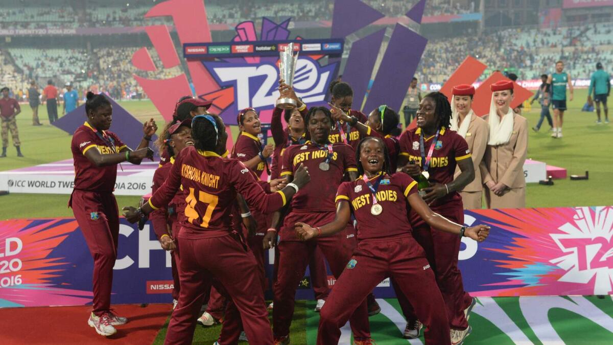 West Indies cricketers celebrate after winning the women's World T20 cricket tournament final match between Australia and West Indies at The Eden Gardens Cricket Stadium in Kolkata on April 3, 2016.