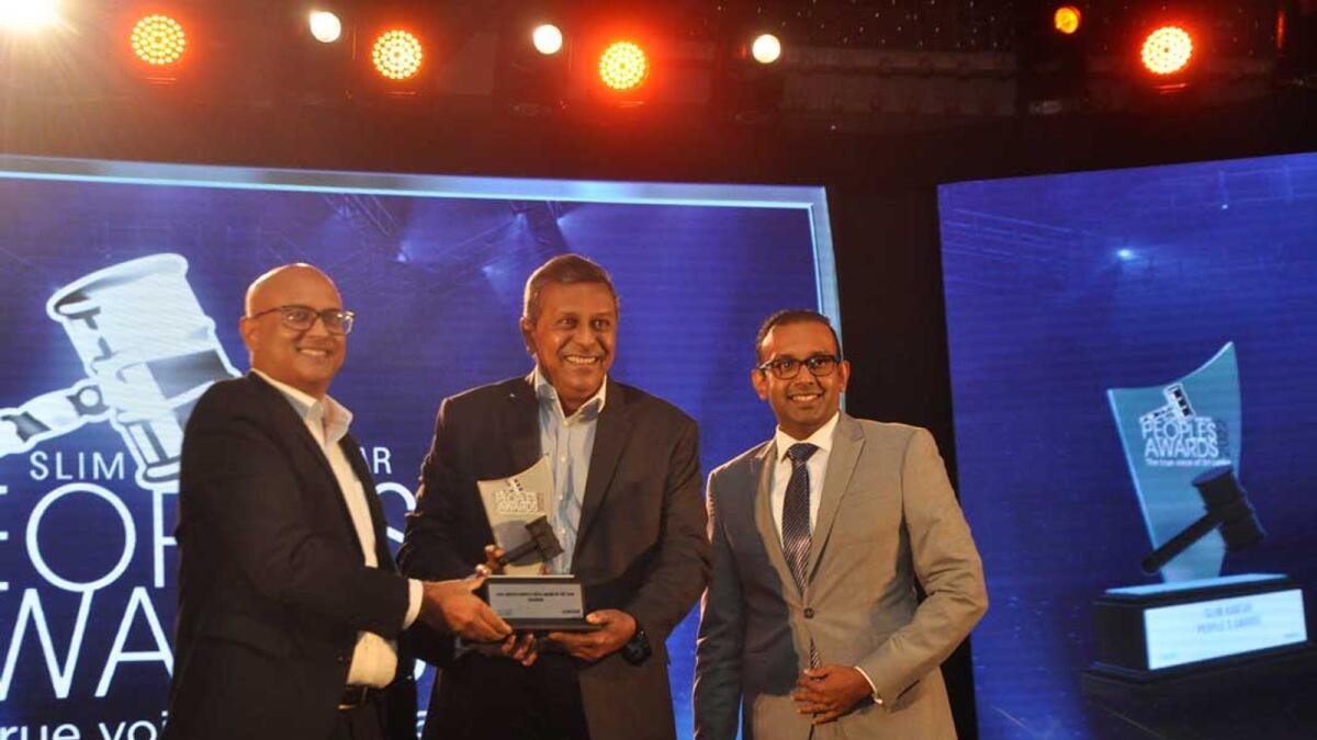 General Manager Sampath Siriwardena and Head of Marketing &amp; Business Development Anuradha Wickramanayaka receive the award. —Supplied photo 