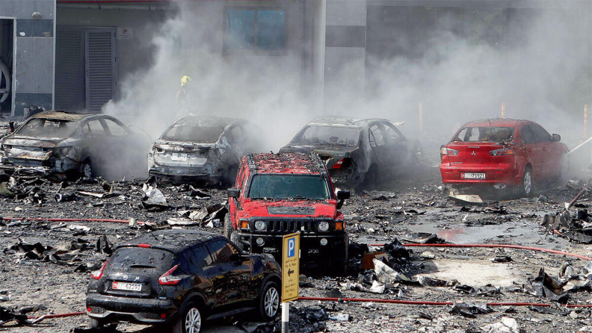 Fourteen cars, all on the sixth level of parking, were destroyed in the fire.