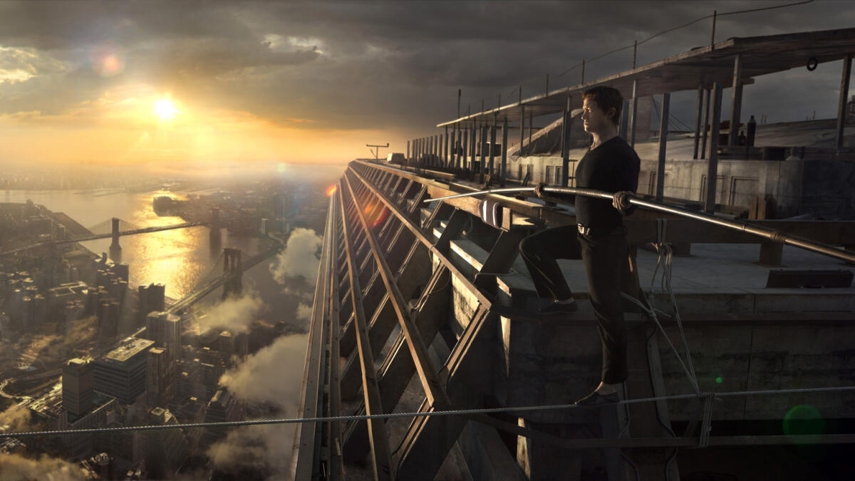 In this image released by Sony Pictures, Joseph Gordon-Levitt portrays Philippe Petite in a scene from, 'The Walk.' The film, about high-wire artist Phillippe Petit?s cabled walk between the Twin Towers in 1974, opened the 53rd New York Film Festival on Saturday, Sept. 26, 2015.  (Sony Pictures via AP)