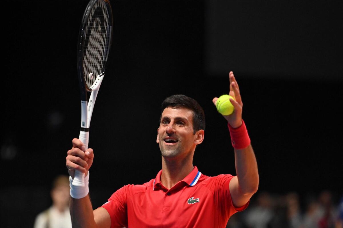 Serbia's Novak Djokovic celebrates after defeating Austria's Sebastian Ofner during the World Tennis League exhibition match at Dubai's Coca-Cola Arena. — AFP