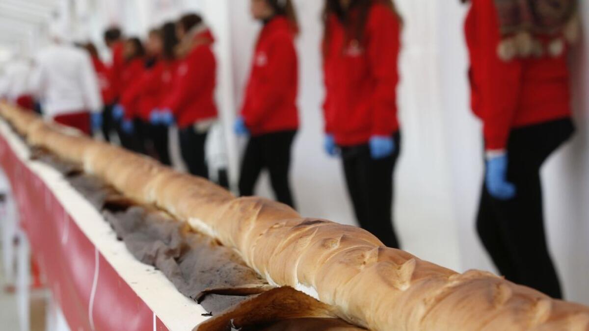 A record long baguette is shown at the Expo 2015 worlds fair, in Rho, near Milan, Italy. 