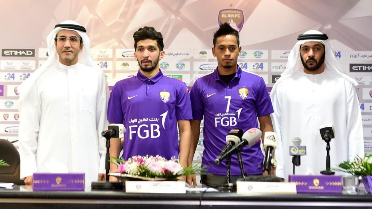 Amer Abdulrahman Alhammadi and Caio Lucas Fernandes with Al Ain officials during the unveiling  on Saturday night. - Supplied photo