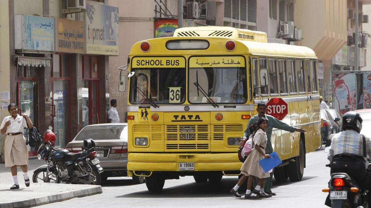 100 school bus, drivers, fined, display, stop signs, Abu Dhabi