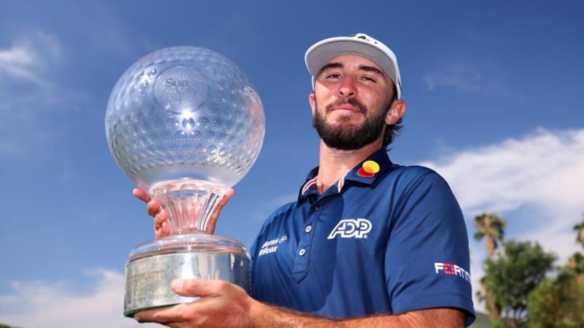 Max Homa (US) takes the Nedbank Golf Challenge winner's trophy on his first visit to Sun City, South Africa, - Supplied photo