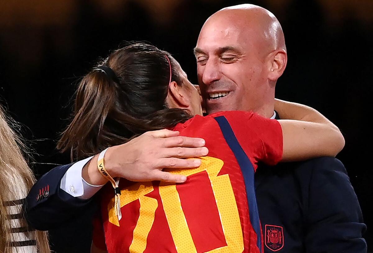 Spain defender Rocio Galvez is congratulated by President of the Royal Spanish Football Federation, Luis Rubiales, after Spain won Women's World Cup. — AFP