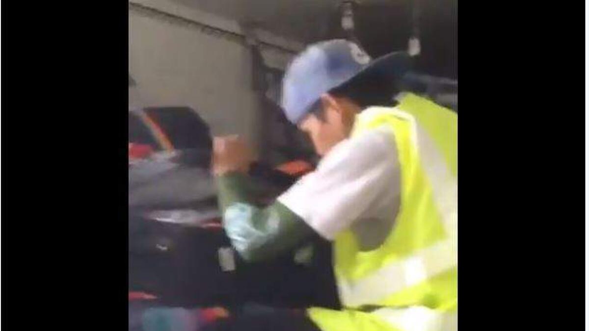 Video: Baggage handler opens passengers bags after loading them on aircraft