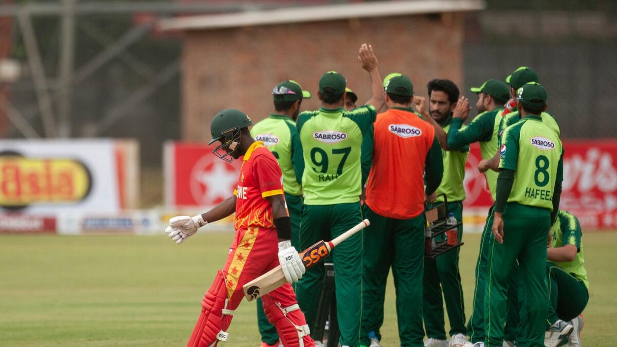 Zimbabwean batsman Tadiwanashe Marumani walks off the pitch after been dismissed during the final T20 match against Pakistan in Harare. — AP