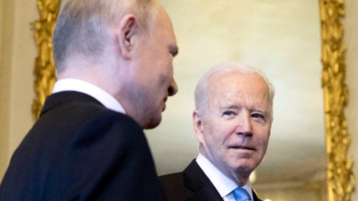 Russian president Vladimir Putin talks with US president Joe Biden during the US - Russia summit in Geneva. — AP