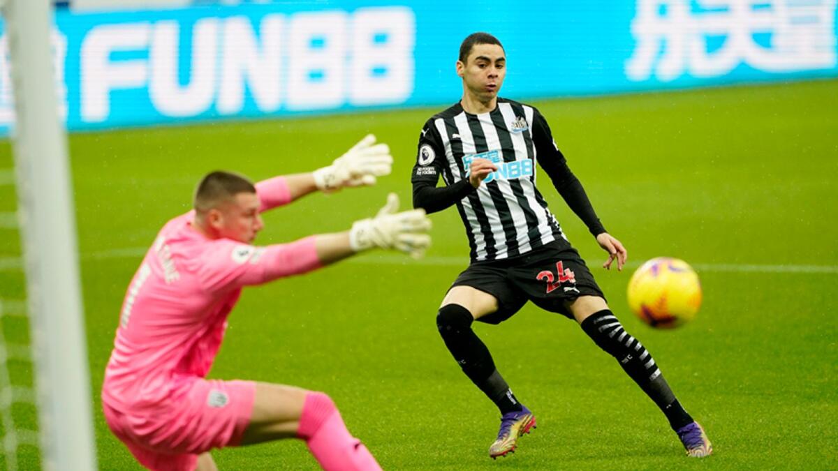Newcastle United's Miguel Almiron scores their first goal against West Bromwich Albion. — Reuters