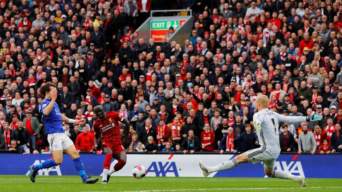 Liverpool keep flying; Spurs crash again