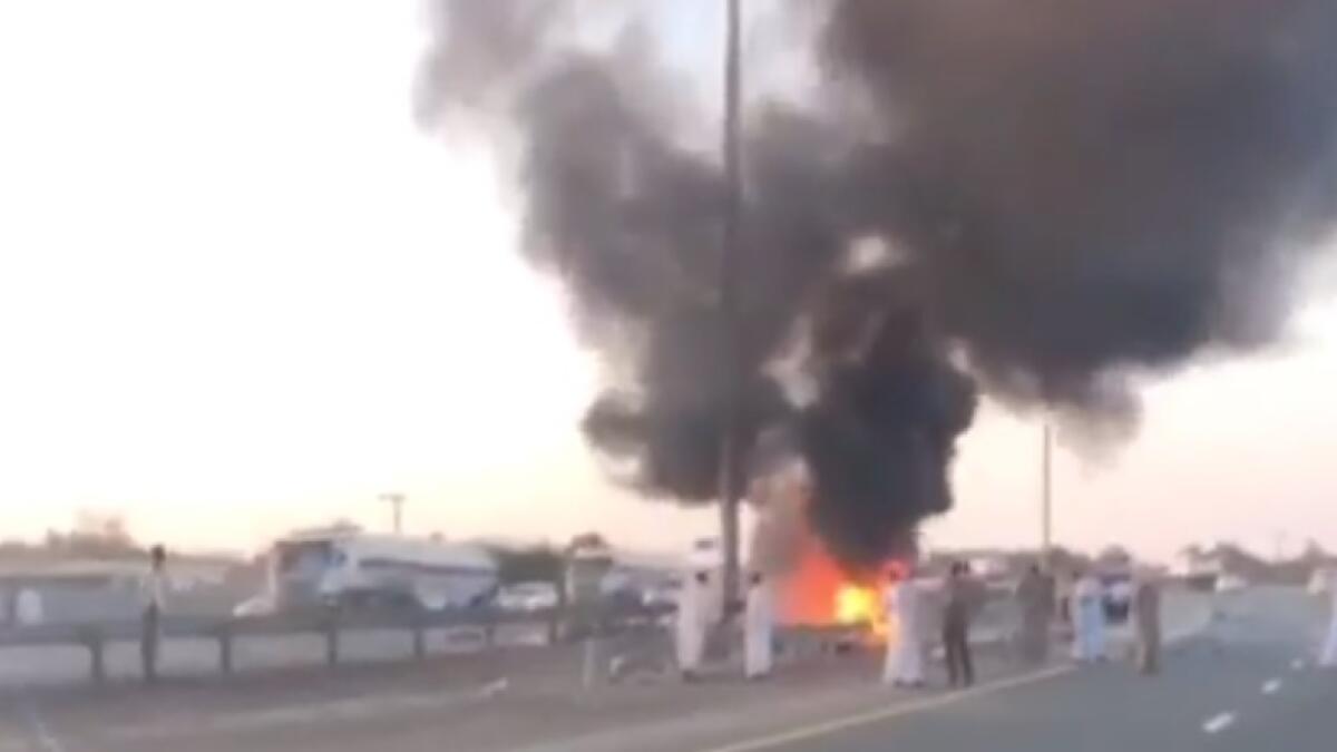 Car crashes into electricity pole in UAE, catches fire