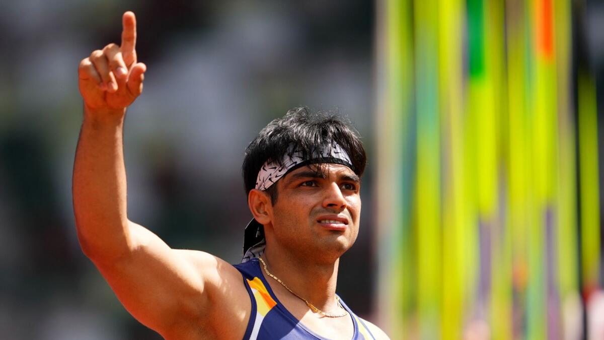 Neeraj Chopra of India reacts after his throw in the qualifying round. (Reuters)