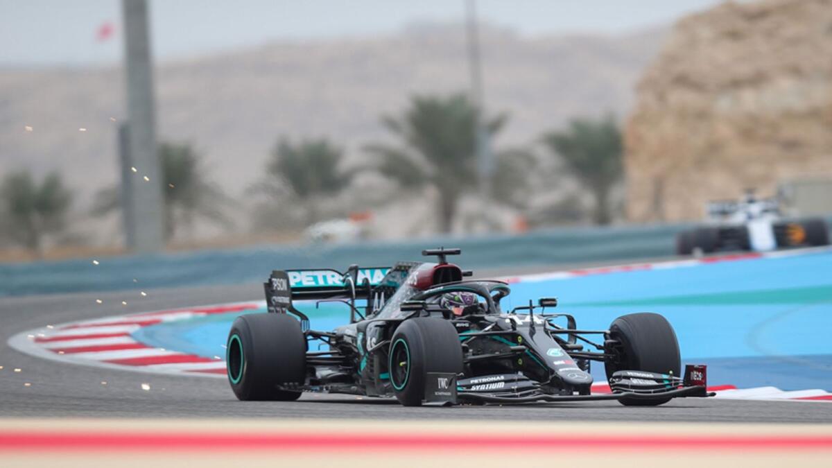 Mercedes' British driver Lewis Hamilton drives his car during the first practice session ahead of the Bahrain Formula One Grand Prix at the Bahrain International Circuit in the city of Sakhir on Friday. — AFP