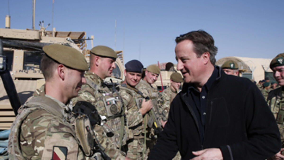 Cameron visits UK soldiers on unannounced Afghanistan trip