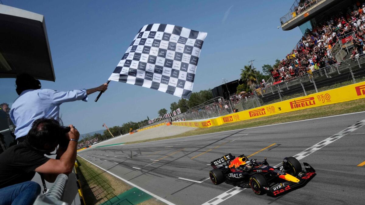 Red Bull's Max Verstappen crosses the finish line to win the Formula One Spanish Formula Grand Prix at the Circuit de Catalunya on Sunday. — AFP