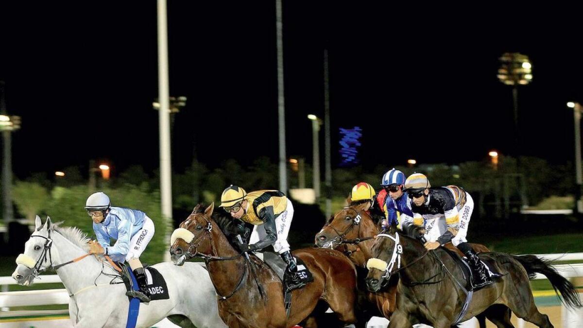 Jockey Hector Crouch pilots Moonlight Dash to victory in the lone Thoroughbred contest. 