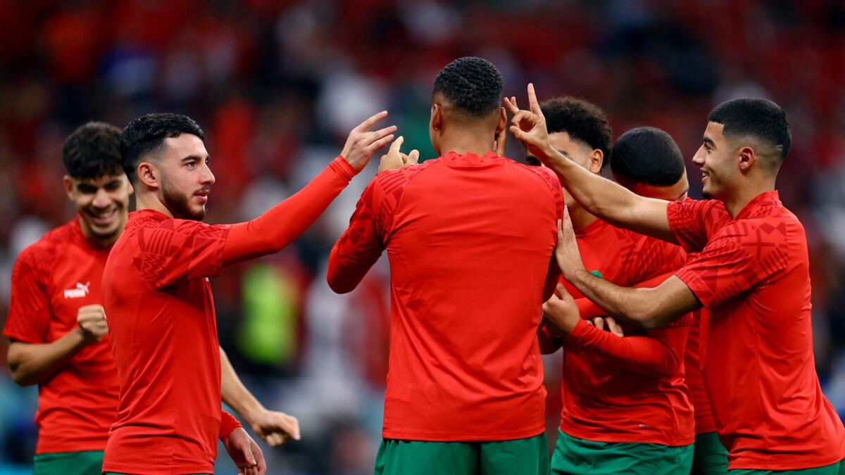Morocco's Ilias Chair with teammates during the warm up before the match. Photo: Reuters