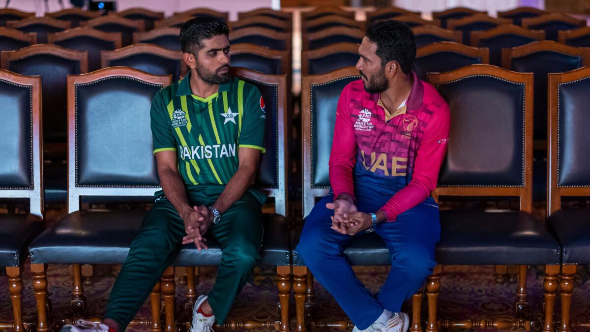 UAE captain CP Rizwan (right) with Pakistan skipper Babar Azam. — ICC
