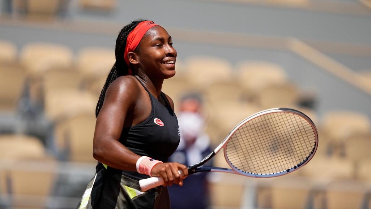 Coco Gauff celebrates her victory over Tunisia's Ons Jabeur. — AP