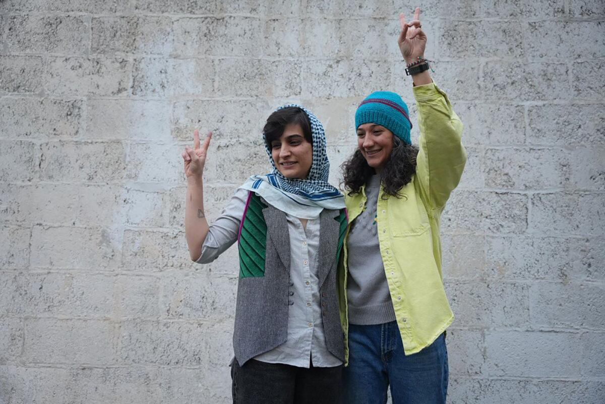Photo: Niloufar Hamedi (R) and Elaheh Mohammadi (L) (AFP)
