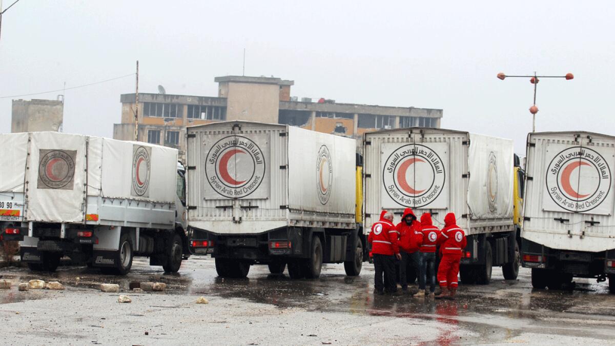 Aid convoy enters besieged, starving Syrian town