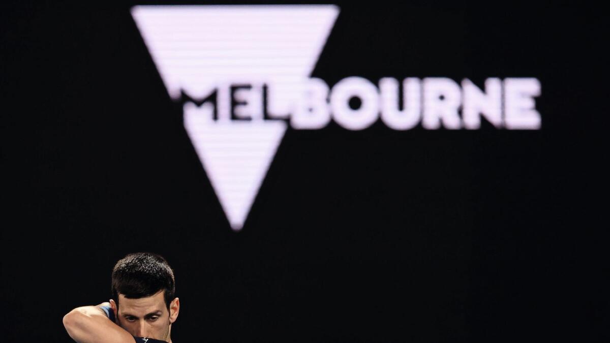 World No.1 Novak Djokovic during a practice session at Melbourne Park on Friday. — AFP