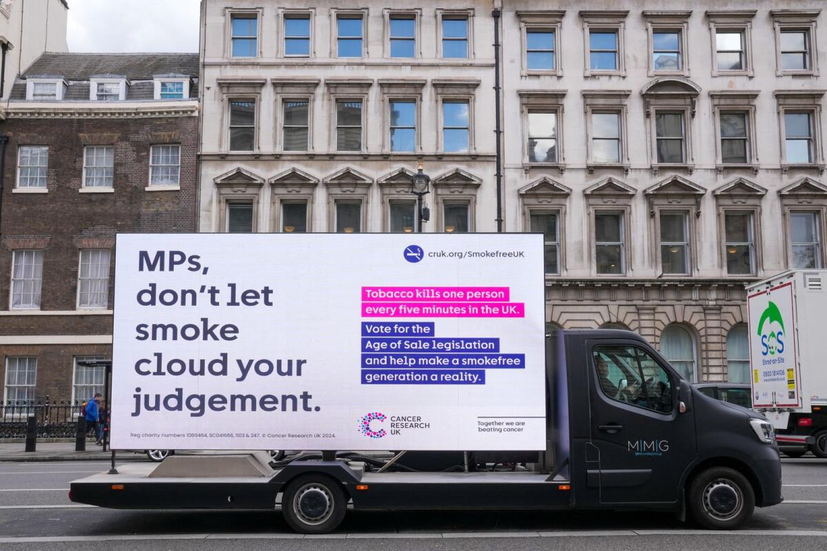 An advertisement on the Age of Sale legislation is seen in Westminister in London, Britain, on April 16, 2024. — Reuters