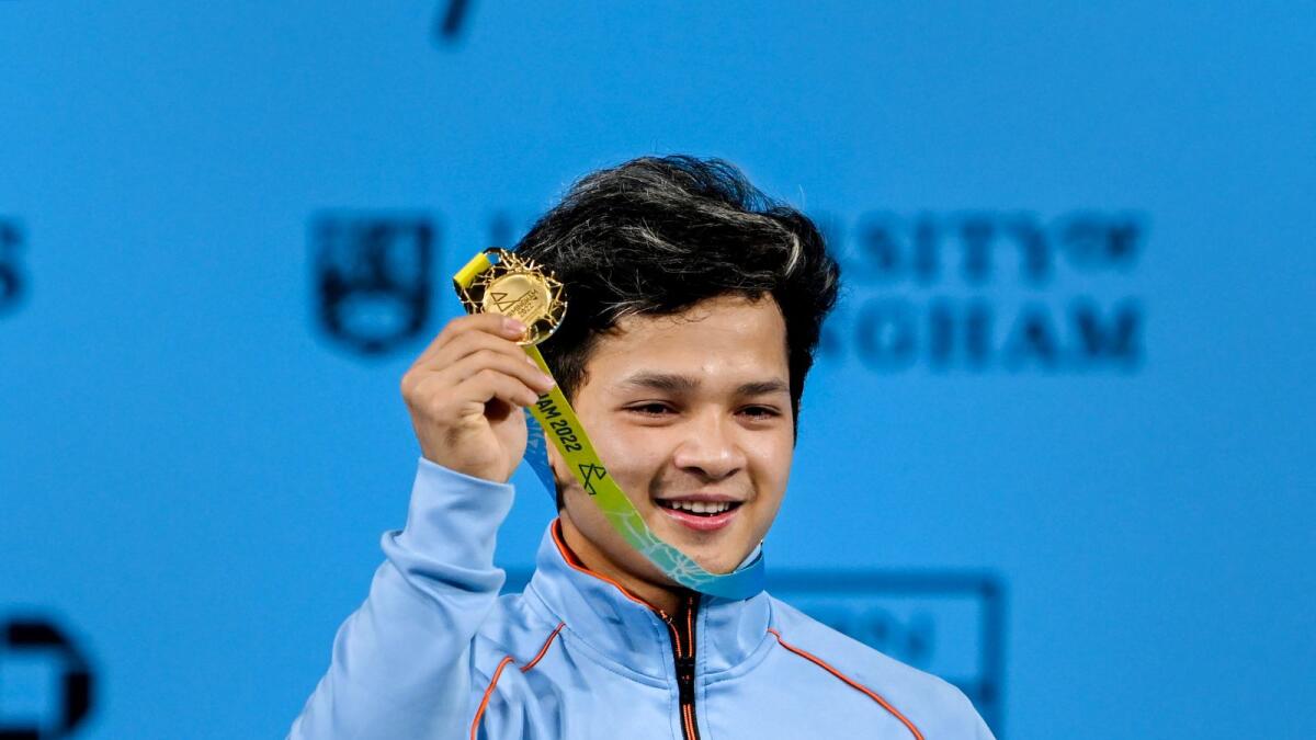 India's Jeremy Lalrinnunga after winning the gold medal in the men's 67kg category weightlifting event at the Commonwealth Games 2022 on Sunday. — PTI