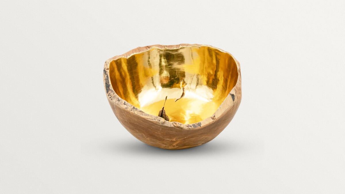 Displaying Eid sweets or enhancing home decor, the Michou Bowls serve as a practical and distinctive gift, emanating opulence through its gold water-gilding technique, enriching any living space. Dh2,900