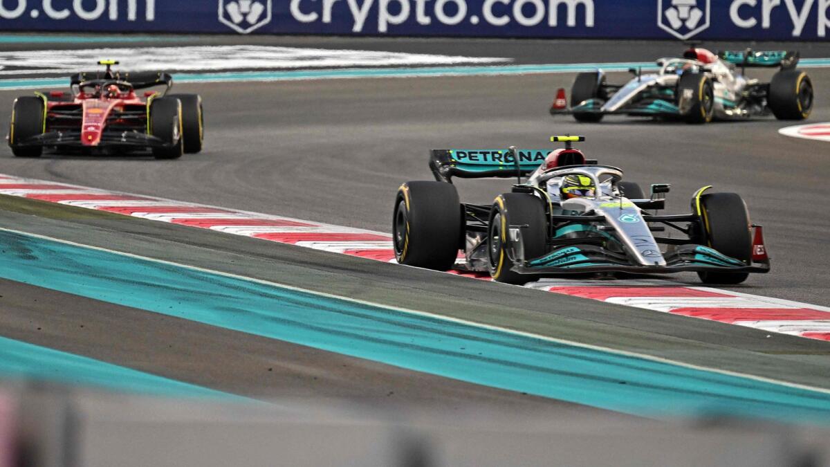 Mercedes' British driver Lewis Hamilton (front row) drives during the Formula 1 Grand Prix in Abu Dhabi on November 20, 2022. -AFP file