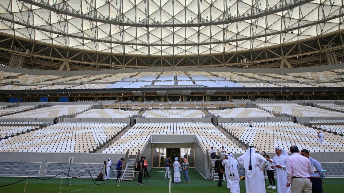 Officials at the Lusail Stadium, the 80,000-capacity venue that will host this year's World Cup final. (AFP)