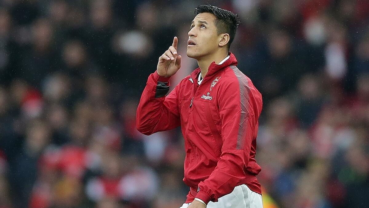 Wenger says Sanchez likely to join United 